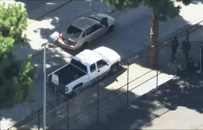 Shooter at large after man found dead inside car near Whittier grade school