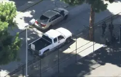 Shooter at large after man found dead inside car near Whittier grade school