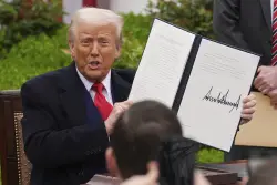 Trump Foes Left Waiting for Armageddon as Tariffs Deliver Historic Surplus
